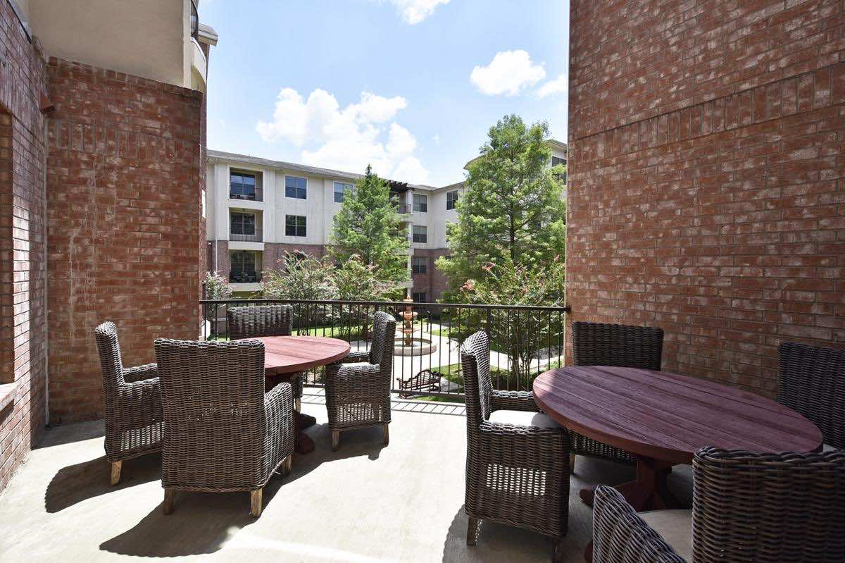 Outdoor Patio & Fireplace at The Abbey at Westminster Plaza